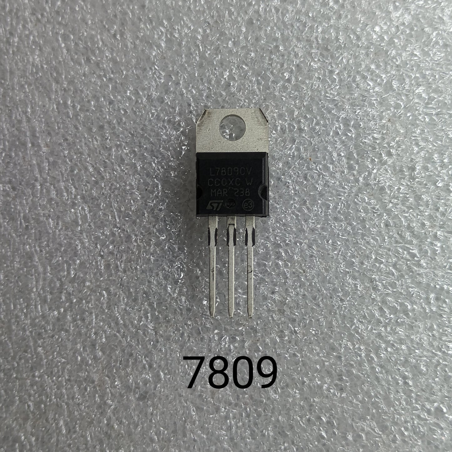 7809