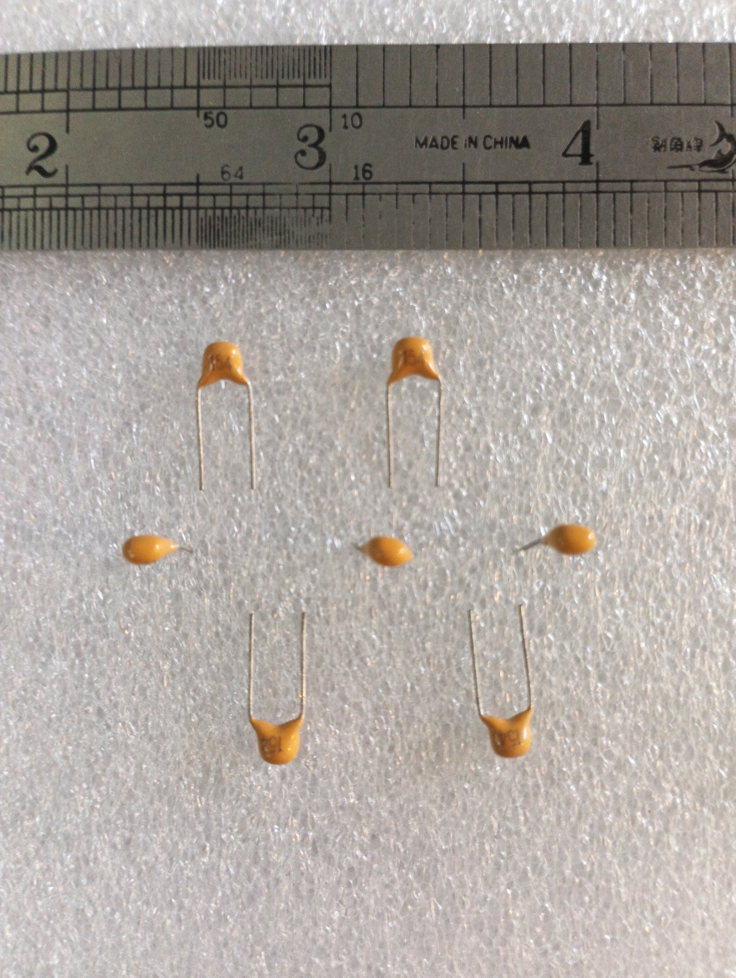 Capacitor m 154