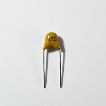 Capacitor m 472
