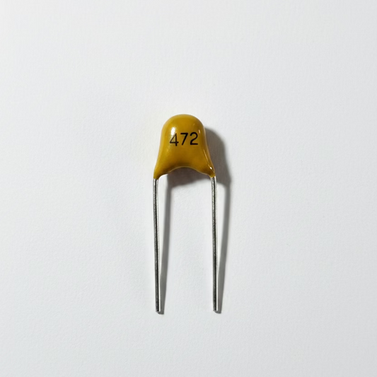 Capacitor m 472