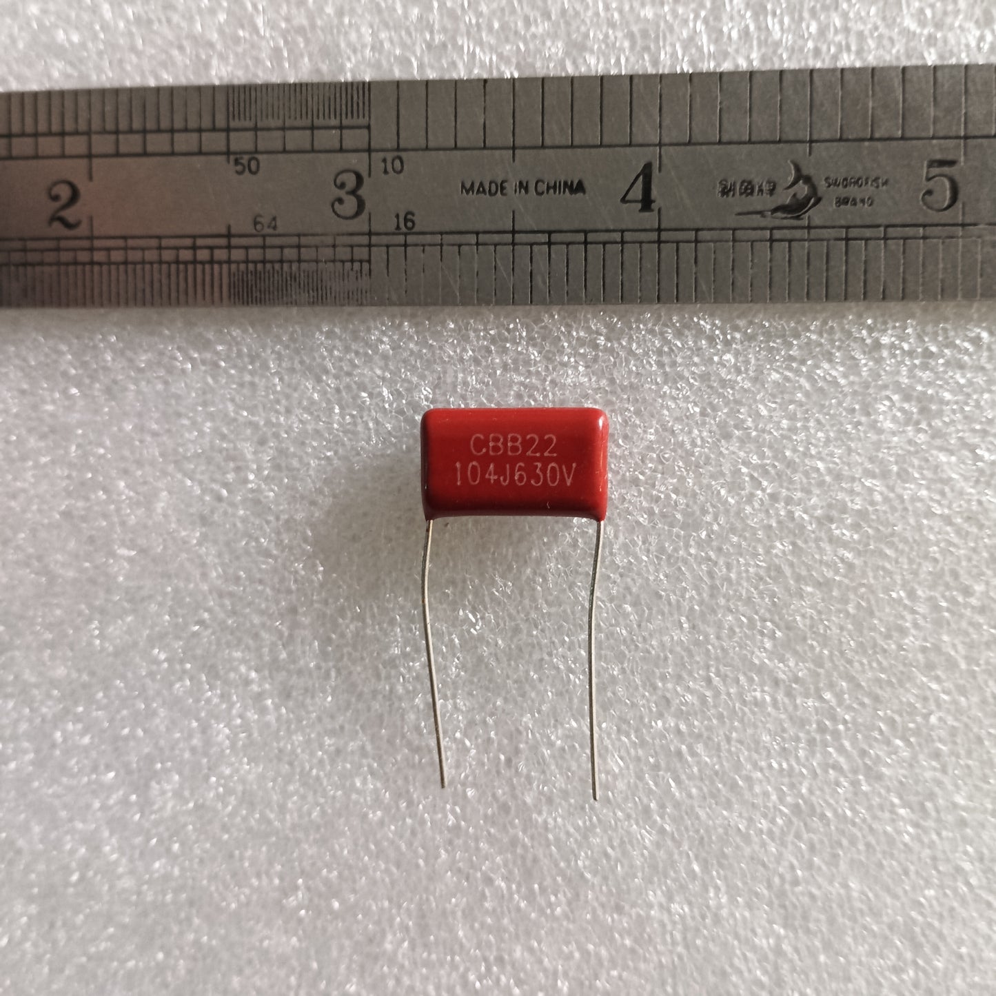 Capacitor m 104/630