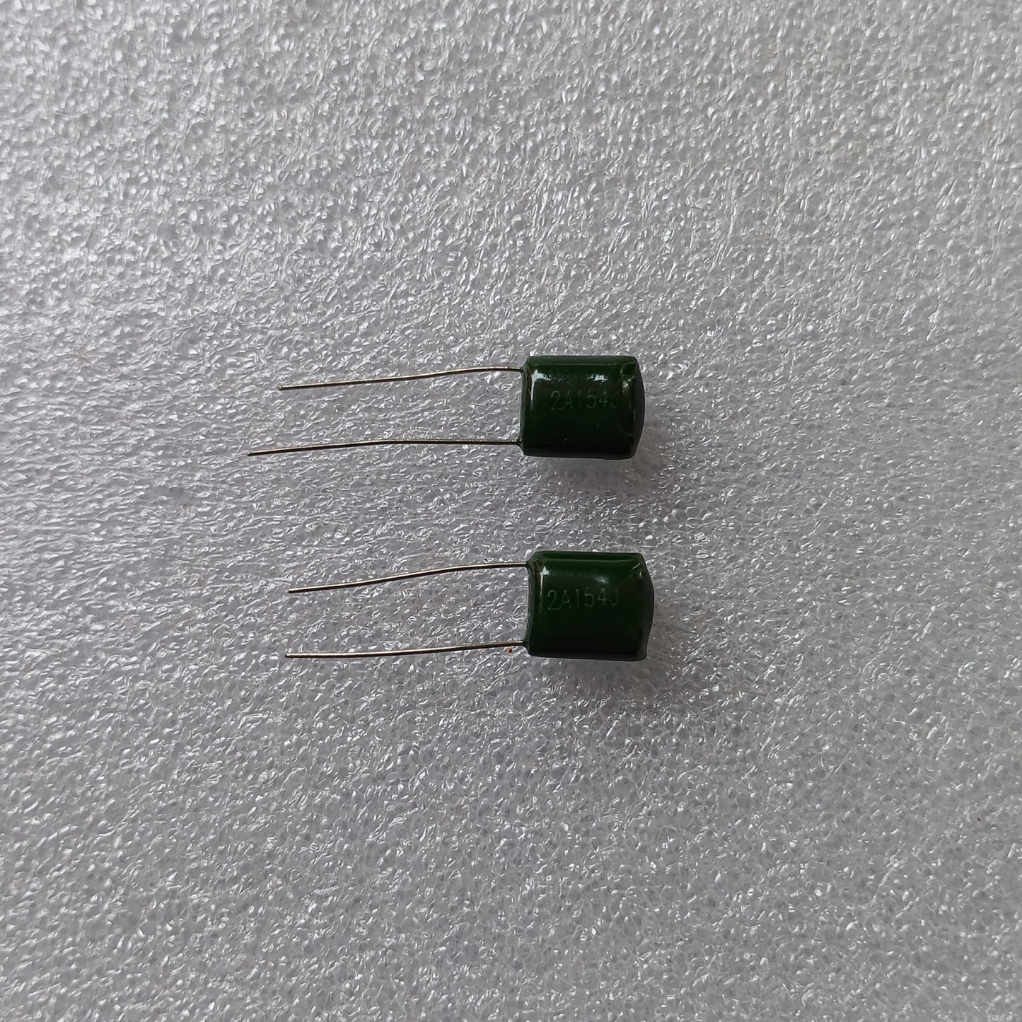 Capacitor m 154